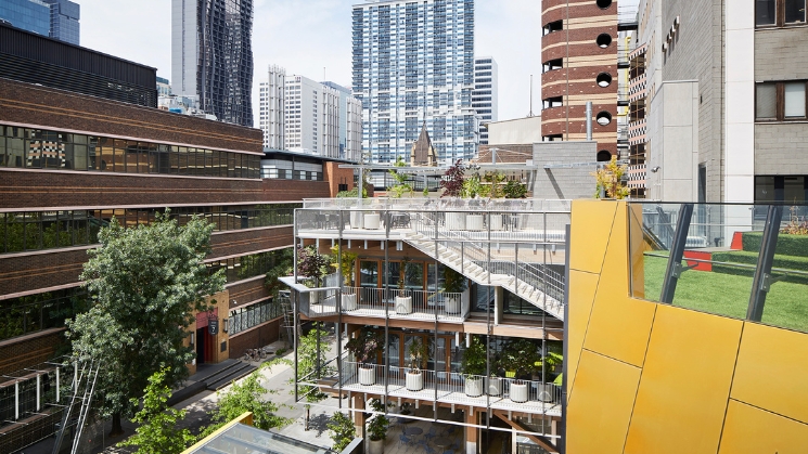 RMIT campus building, midrise height with rooftop gardens