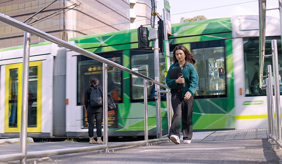 Girl getting off tram