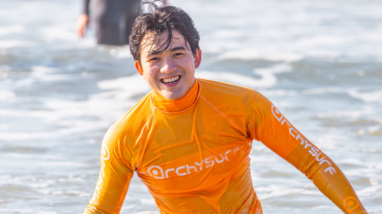 A person smiling in the water