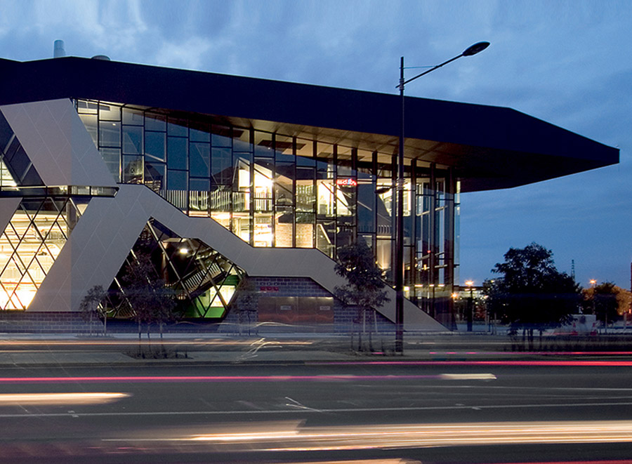 Modern building of Bendigo Kangan TAFE at dusk, moody sky