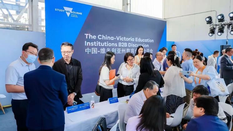 Delegates mingling at the Study Melbourne stall at the 2024 China International Fair for Trade in Services