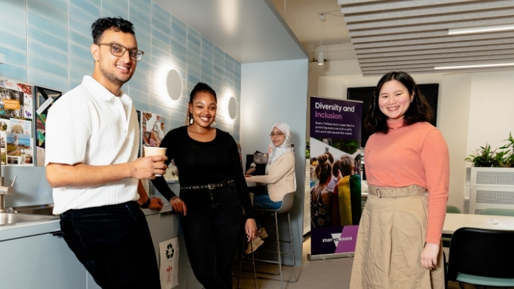 Students gathered in the kitchen area at the Study Melbourne Hub