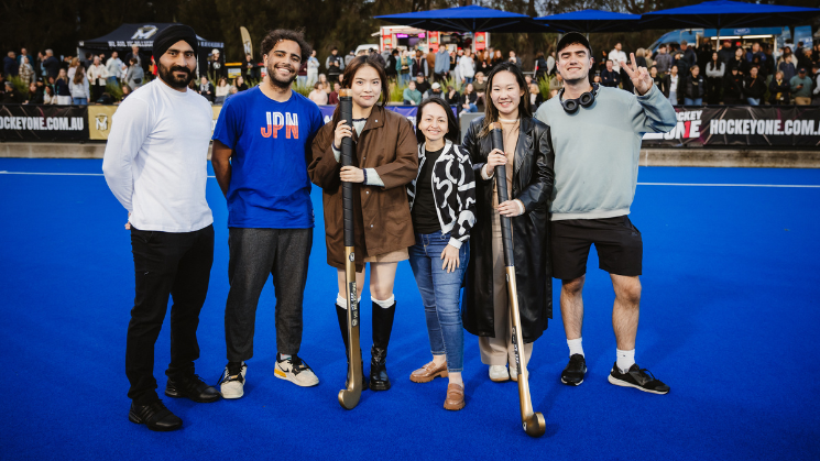 Students posing for a Hockey Event 