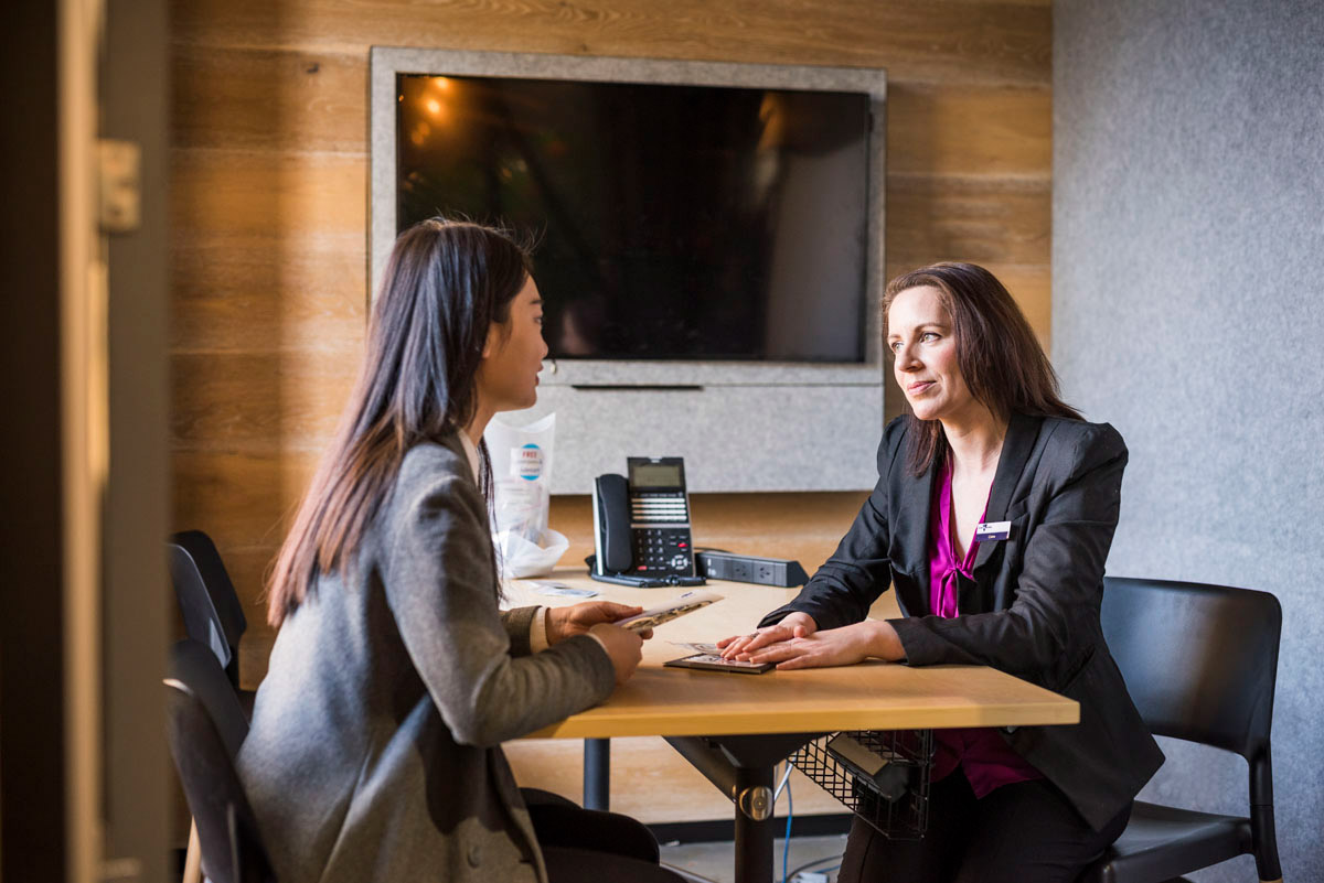 Agent speaking with student