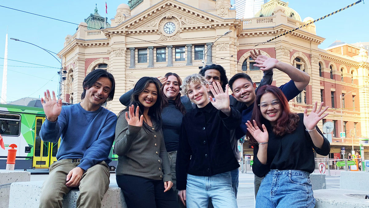 Students in front of the Flinders Street Station