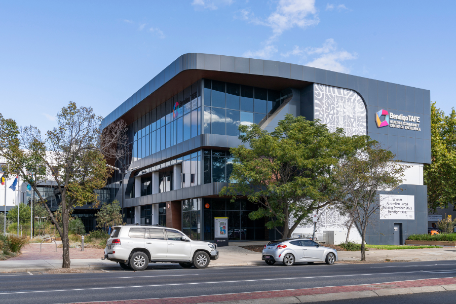 Metallic Bendigo TAFE building with signage