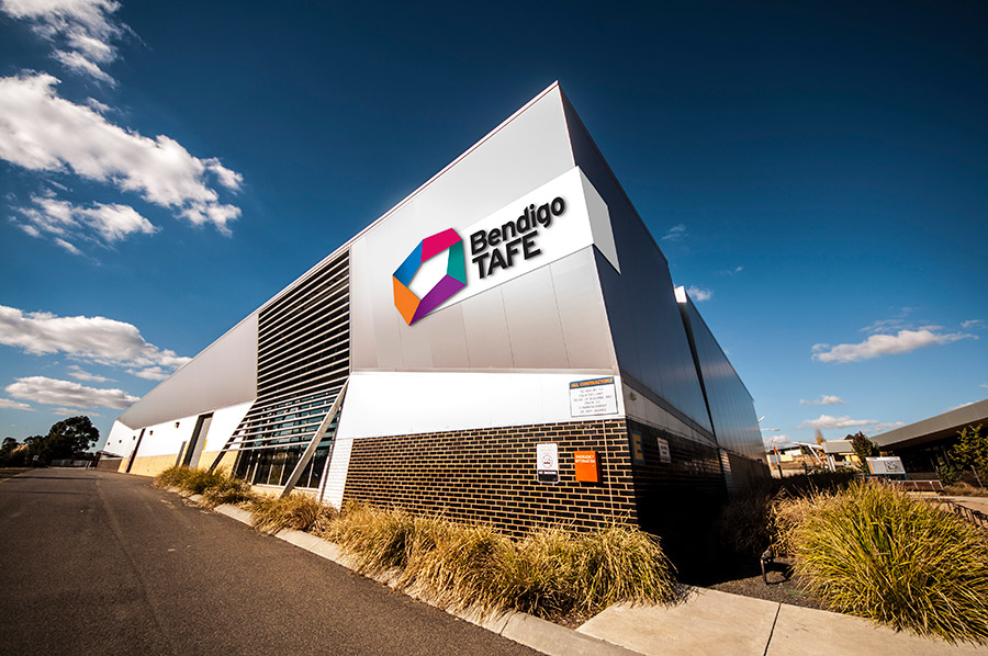 Metallic Bendigo TAFE building with signage