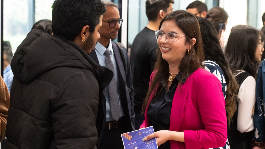 People speaking at an event