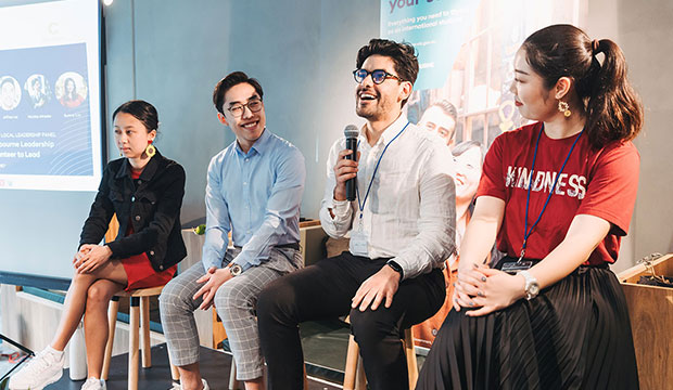 Students speaking at an event