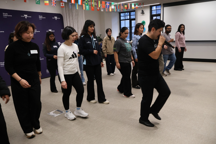 students learning to dance in a salsa class