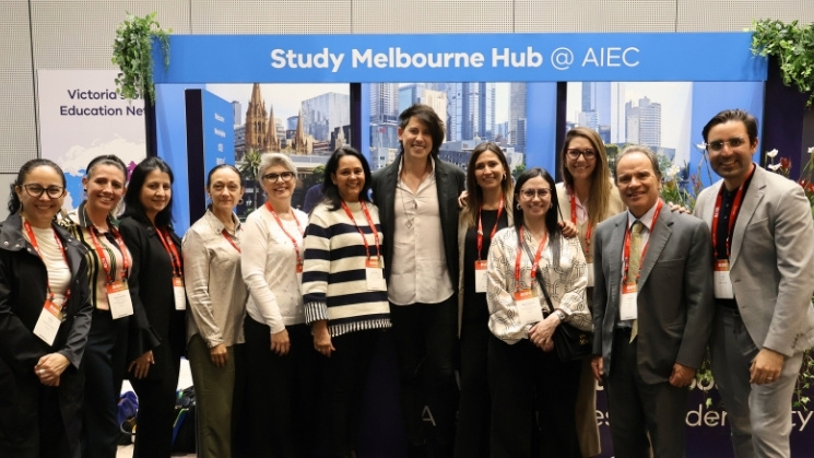 AIEC delegates and Study Melbourne staff  in front of the Study Melbourne pop up hub at the AIEC conference