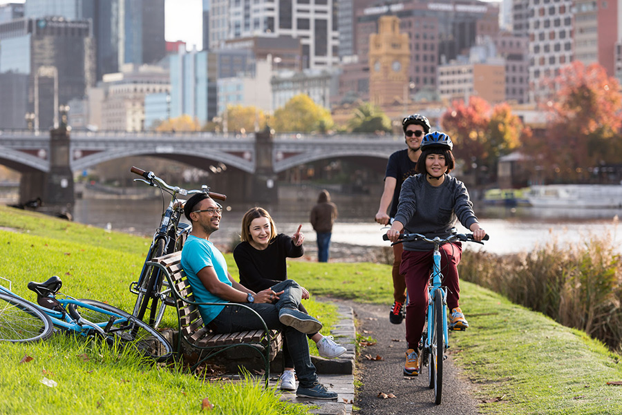 Riding bikes along river