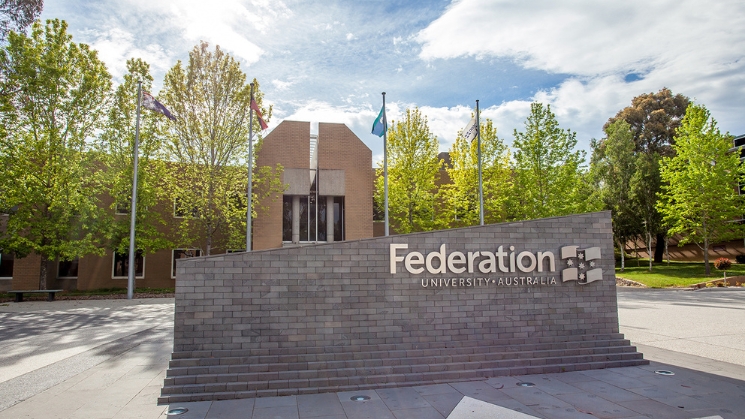 Federation University Australia campus with signage and buildings in background