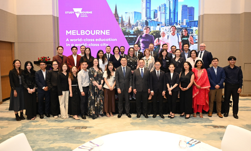 Group of people standing together at an event