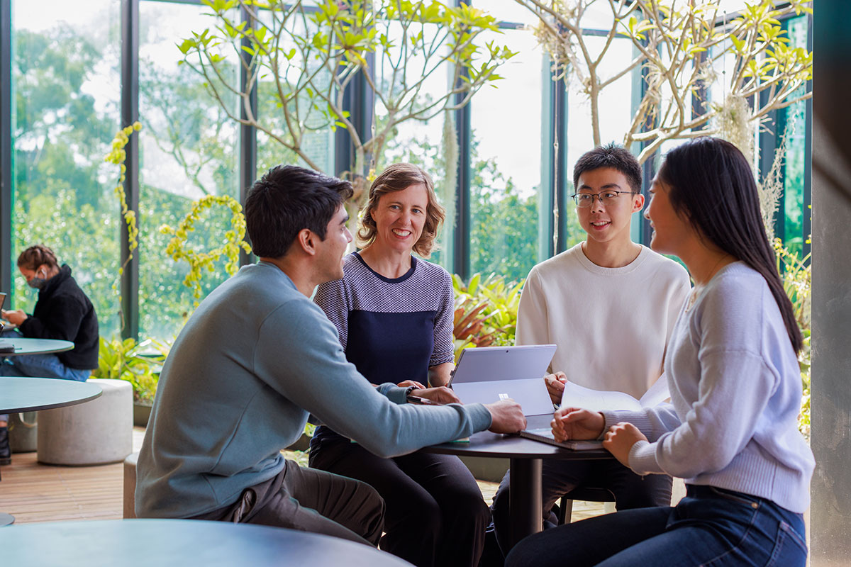 Students chatting around a table