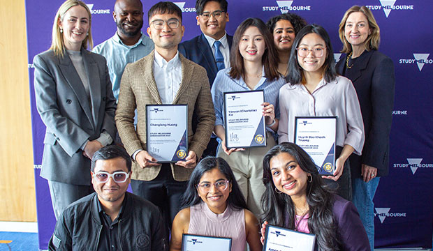 Ambassadors holding certificates