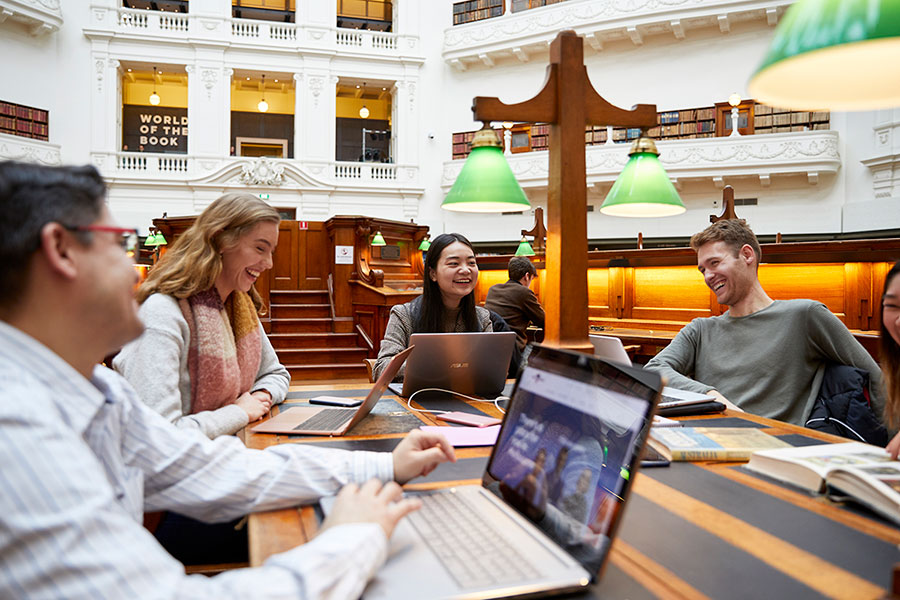 Students laughing in the state library