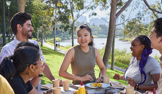 Young people having a bbq near the Yarra