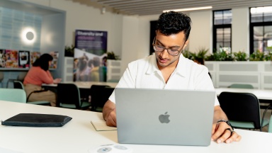 Student working on their laptop at the Study Melbourne hub