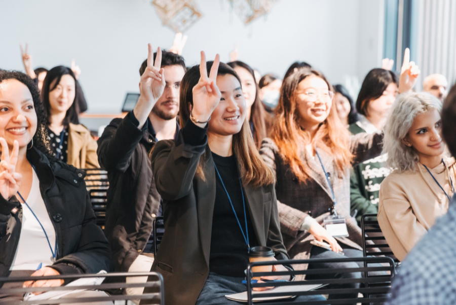 Photograph showing diverse group of attendees at an event.
